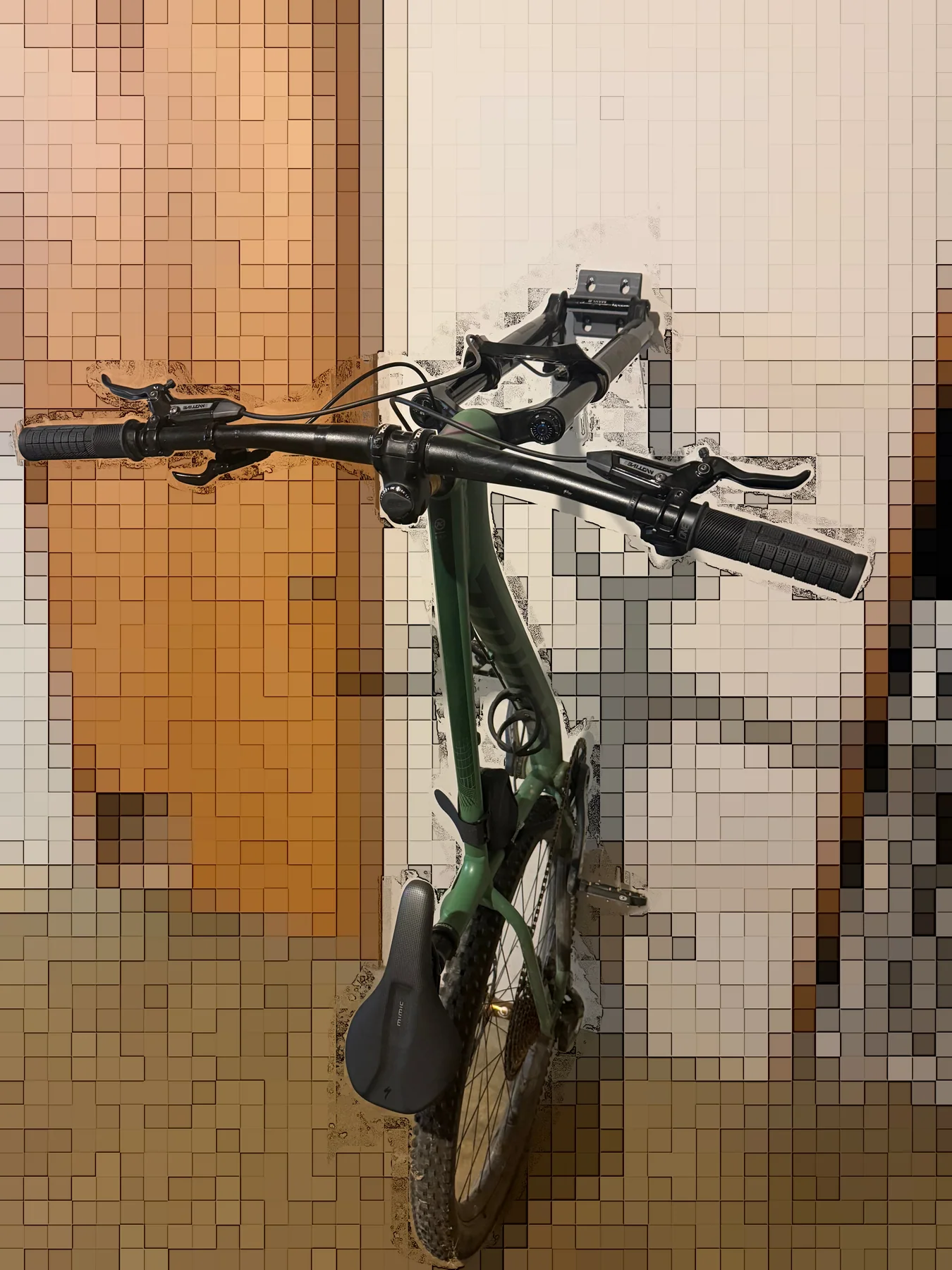 Angled view of a mountain bike held vertically by the KT-31 wall-storage mount